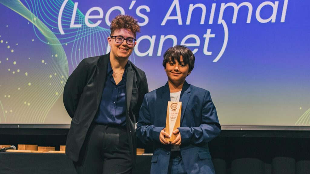 Born Free Junior Ambassador Leo receiving his award on stage