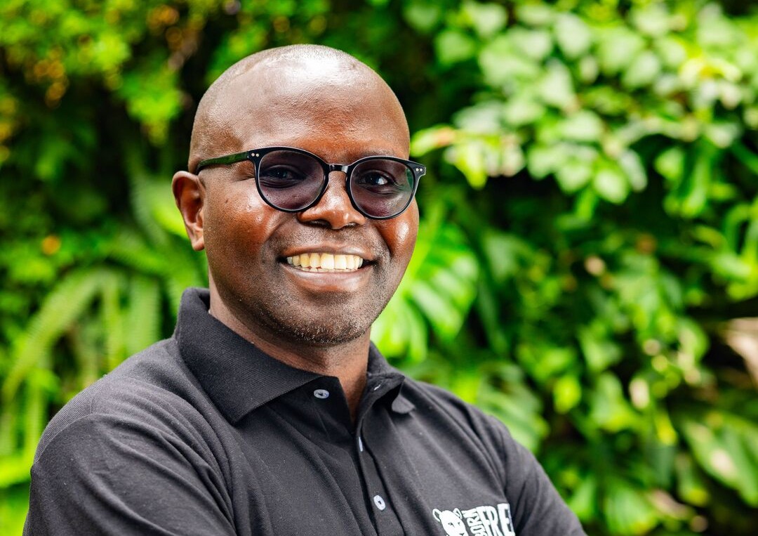 A headshot of Michael Mugo