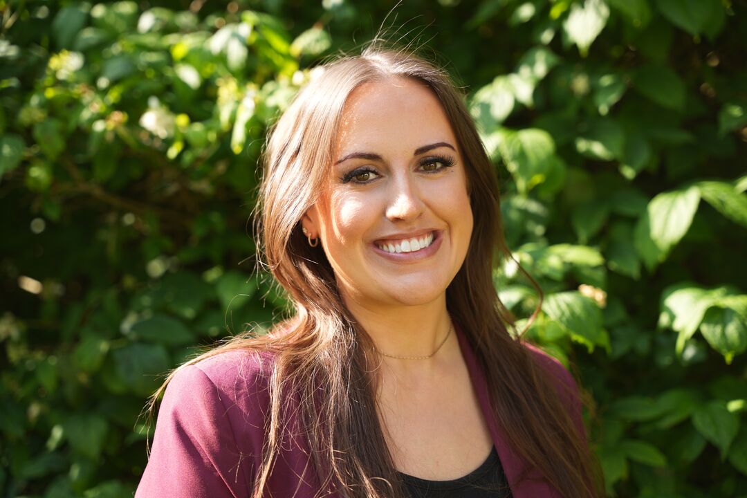 A headshot of Olivia Evans