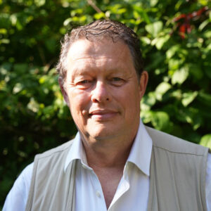 A head and shoulders photo of Will Travers OBE